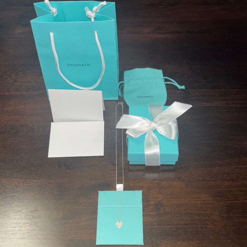Tiffany & Co. Silver Mini Heart Pendant with Iconic Blue Packaging